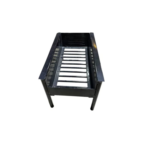 Tromen brasero firebox burning wood and charcoal beside an Argentine parrilla grill